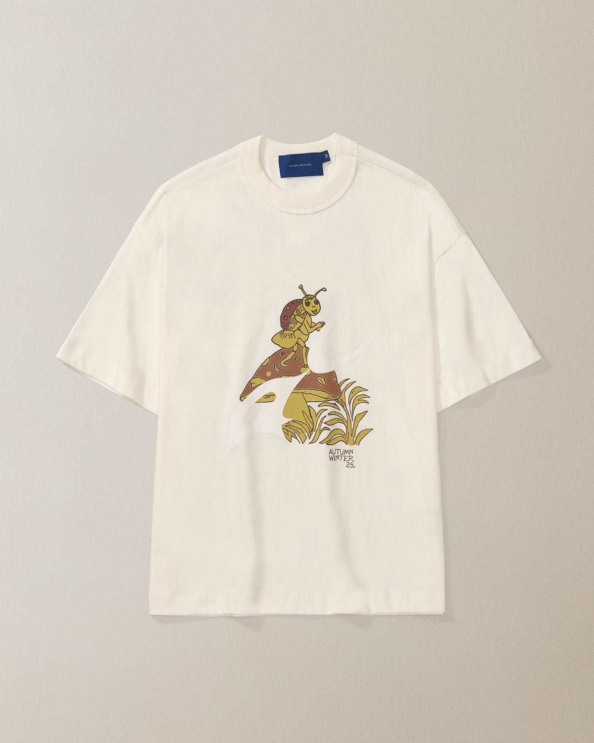 Camiseta QC Joaninha Boxy Off White