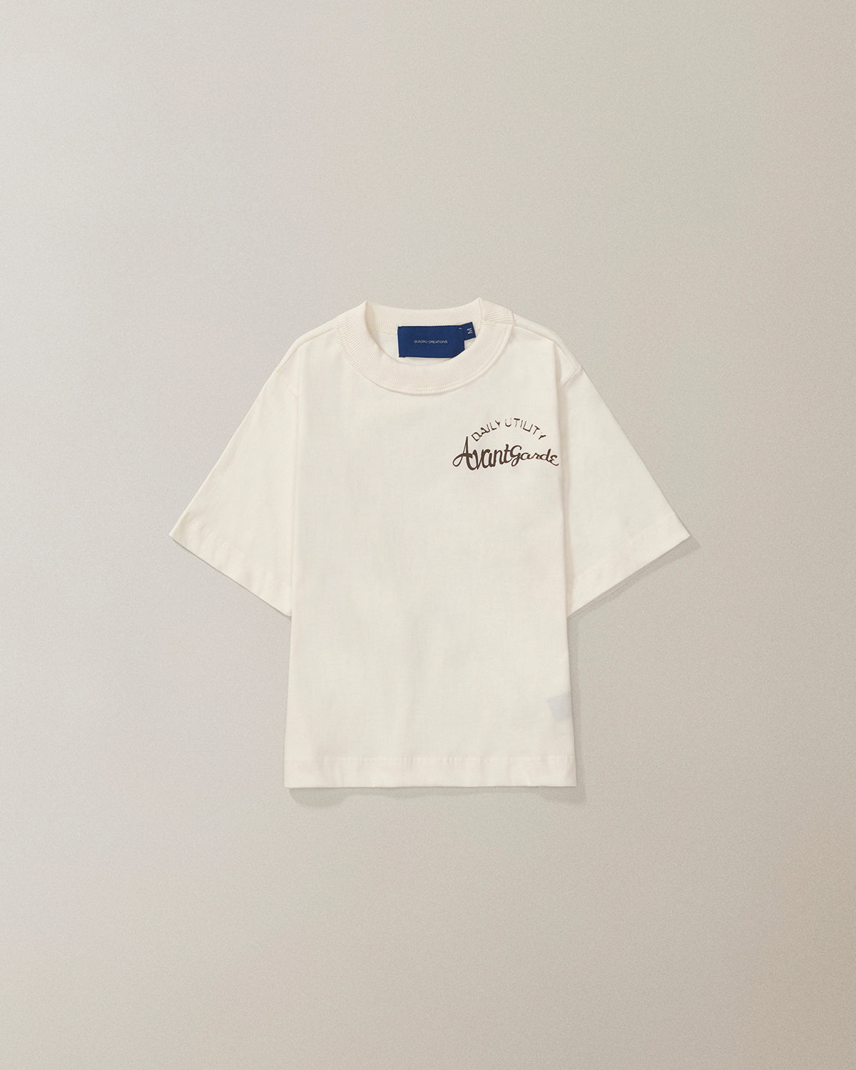 Camiseta QC Daily Cogu Boxy Off White